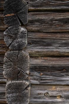 Wooden log cabin or felling  Rustic texture or background. Aged wood wall and boards