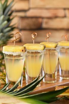 Double shots of tropical tequila with pineapple juice. This is definitely going to be a great party for Cinco de Mayo!