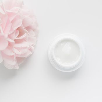 beauty cream jar and rose petals - cosmetics with flowers styled concept