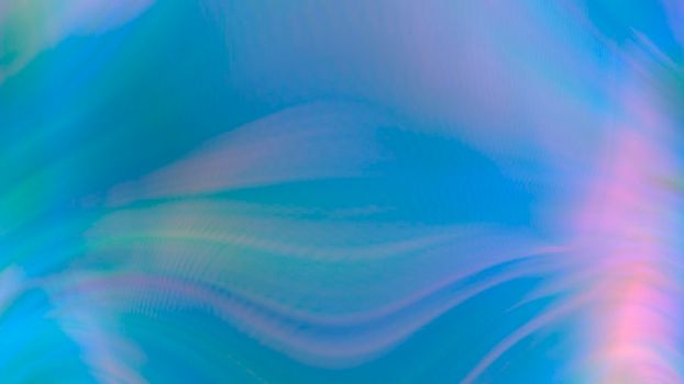 Abstract blue gradient blurred background with rainbow highlights. Design, art