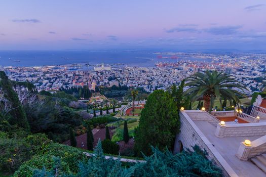 Sunset view of the Bahai Shrine and gardens, with the downtown and the port, in Haifa, Northern Israel