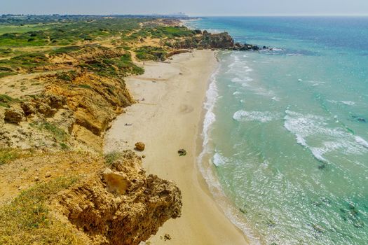 View of the beach and sandstone cliffs in Gedor Sea Reserve, Hadera, Northern Israel