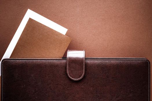 Productivity, work and corporate lifestyle concept - Vintage business briefcase on the office table desk, flatlay background