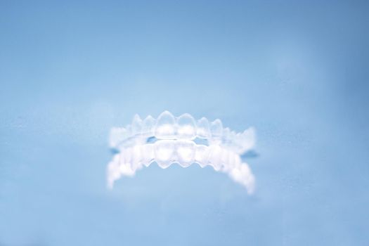 Clear denture to align teeth. No people