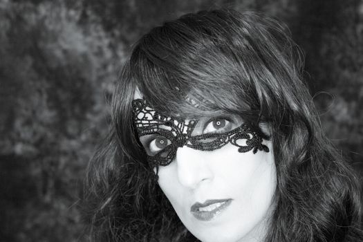 Woman disguised in gothic style for halloween party with mask