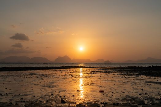 Tropical nature clean beach sunset sky time with sun light background.