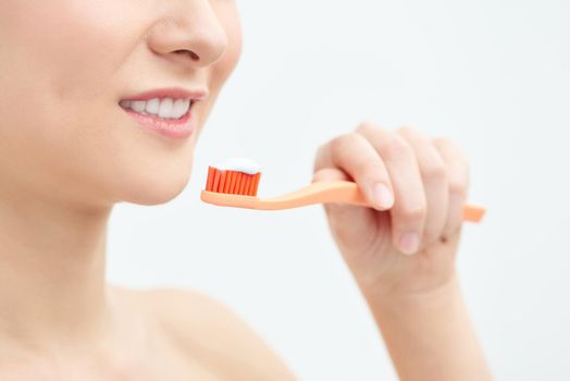 White Teeth with toothbrush. Dental health background