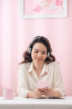 happy woman with headphones listening to music