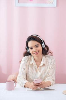 happy woman with headphones listening to music