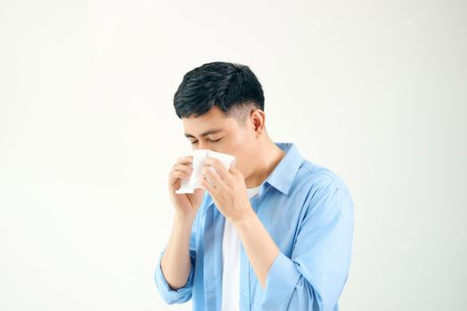 A man catches a cold, illness, asian