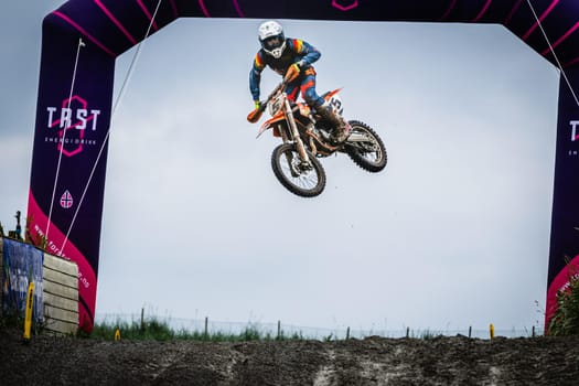 Motocross practise - air jump and high speed.