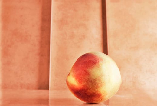 Beautiful  peach on colored background  