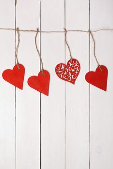 Wooden heart  on a string. Valentine's Day