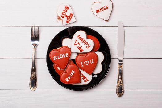 Cookies heart lie on a plate. Valentine's Day