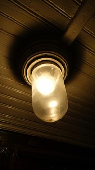 Kiruna, Sweden, February 22, 2020 Old ceiling lamp turned on
