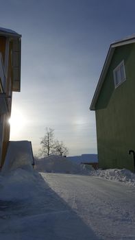 Kiruna, Sweden, February 23, 2020. Historic buildings along one of the snow covered streets in the center during the winter.