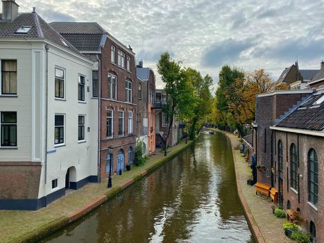 Traditional houses on the Oudegracht (Old Canal) in center of Utrecht. Utrecht is a very old city and the fourth largest city in country.