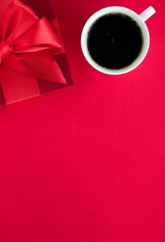 Romantic celebration, lifestyle and birthday present concept - Luxury beauty gift box and coffee on red, flatlay