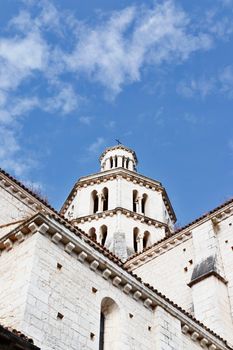 Beautiful bell tower of Cistercian abbey of Fossanova -Italy - in the foreground part of abbey exterior walls