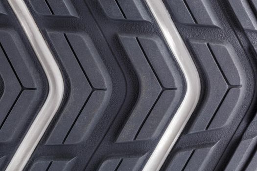 close-up full frame background of new generic contemporary sneakers outsole with protector shapes.