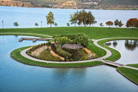 Landscape of recreational park on Okanagan lake shore.