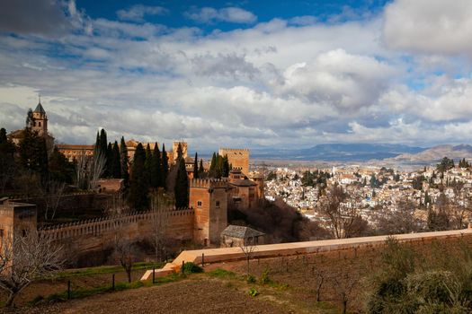 The Alhambra is a palace and fortress complex located in Granada, Andalusia, Spain. It was originally constructed as a small fortress in AD 889 on the remains of Roman fortifications