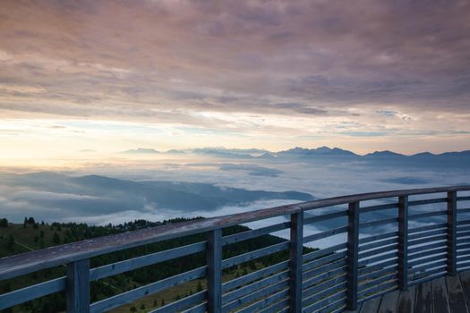 Autumn morning in ski resort, Carnic Alps, Austria. Beautiful view from the tower on the Slovenia mountains