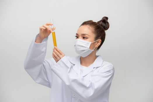 Woman doctor doing chemical tests in laboratory
