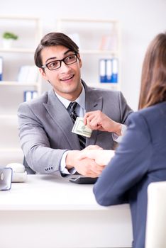 Businessman being offered bribe for breaking law