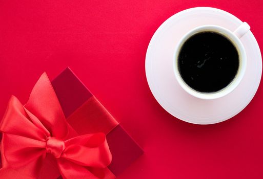 Romantic celebration, lifestyle and birthday present concept - Luxury beauty gift box and coffee on red, flatlay