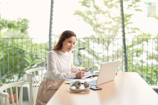 Beautiful business woman using a laptop computer