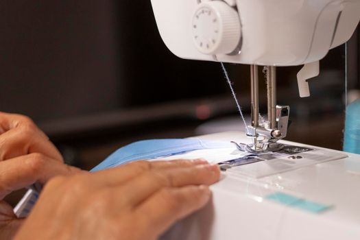 Sewing machine worked by a seamstress