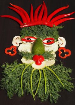 Fresh vegetables. A picture of vegetables. Portrait of a man made of vegetables. High quality photo