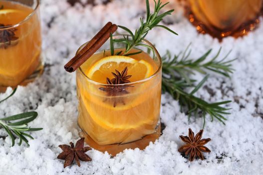 Negroni cocktail. Bourbon with cinnamon with oranges juice and star anise.The perfect cozy cocktail for chilly December evenings.