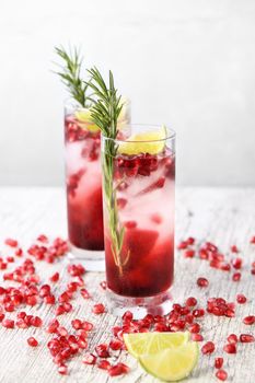 Pomegranate Gimlet - a gin based cocktail with lime juice, gin can be replaced with vodka.