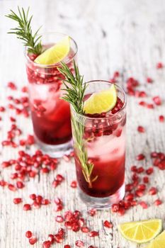 Pomegranate Gimlet - a gin based cocktail with lime juice, gin can be replaced with vodka.