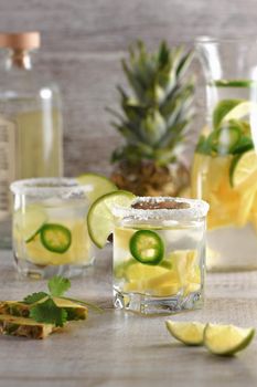 Spicy Margarita. Tequila Infused on Slices of Fresh Pineapple, Lime,  hot jalapeno