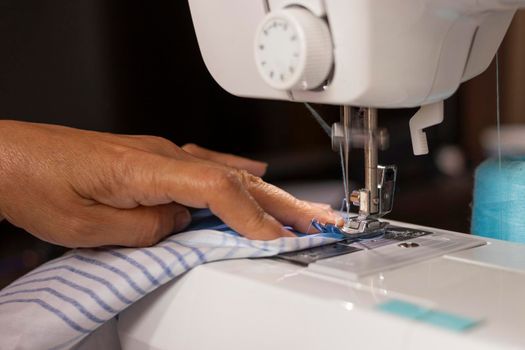 Sewing machine worked by a seamstress