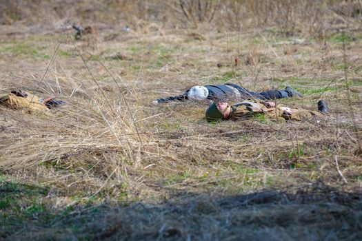 Reconstruction of the Second World War. Wounded soldiers lie on the battlefield. The Great Patriotic War. Liberation of Odessa. Zelenograd Russia April 18, 2021