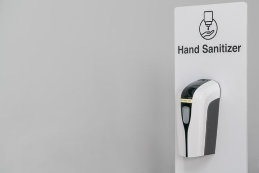 Automatic alcohol dispenser. Sanitation station for cleaning of hands.