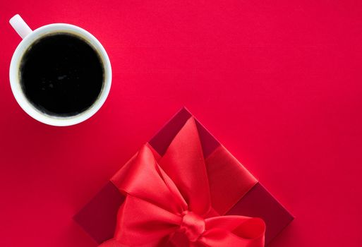 Romantic celebration, lifestyle and birthday present concept - Luxury beauty gift box and coffee on red, flatlay