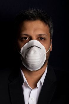 Young handsome with medical mask to prevent the spread of contagious viruses or chemical gases
