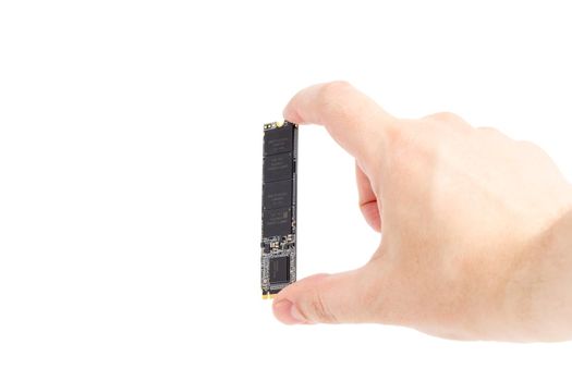 caucasian hand holding Non-Volatile Memory Next Generation Form Factor solid state drive 2280 3Dnand Single-Level Cell drive stick isolated on white background