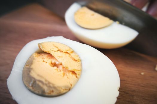 Chicken eggs on a cutting board