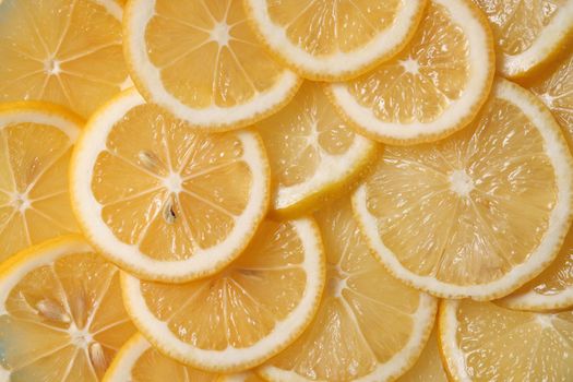 Fresh lemon lies on a blue textured background