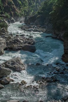 Beautiful marshyangdi river flowing peacefully through a valley, Annapurna circuit, Nepal