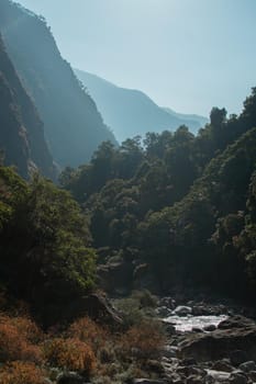 Harsh sunlight shining over Marshyangdi river, trekking around Annapurna circuit, Nepal