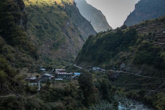 Nepalese mountain village by the Marshyangdi river, Annapurna circuit, Himalaya, Nepal, Asia