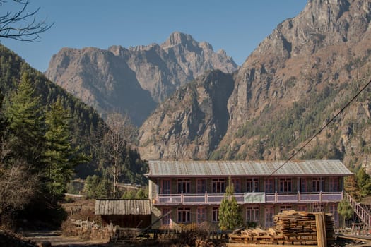 Trekking Annapurna circuit past mountain village and tea houses, Lamjung district, Himalaya, Nepal, Asia