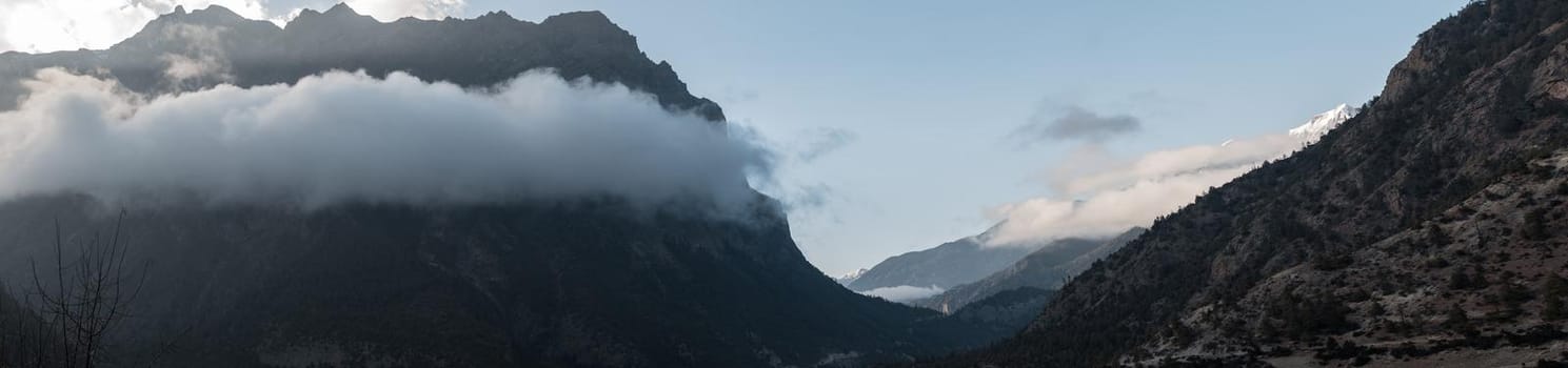 Panorama of mountains surrounding Upper Pisang, over Marshyangdi river, Annapurna circuit, Nepal